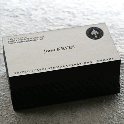 cotton-business-cards-with-deboss-and-black-painted-edges