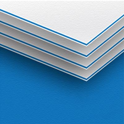 Premium 32pt business card showcasing a vibrant blue-colored core edge, creating an eye-catching and professional contrast against the crisp white surface