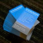 Dull matte finish business cards offering a smooth, sophisticated texture for an understated yet professional impression